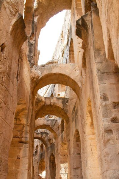 Iconic keystone arches found along the interior corridors of El Jem.