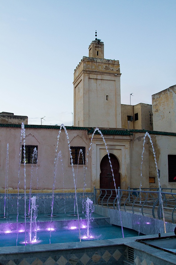 A colorful lighted fountain discovered in Fez in the evening.