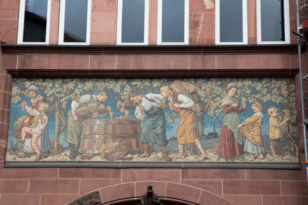 This building frieze shows the grape harvest.