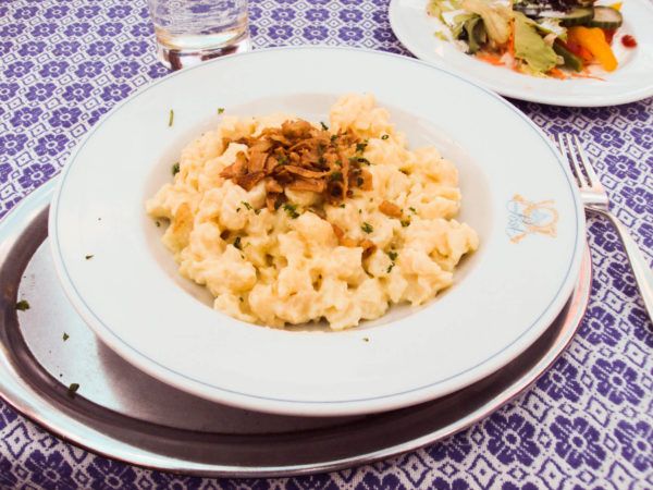 A dish of creamy cheese spaetzle.
