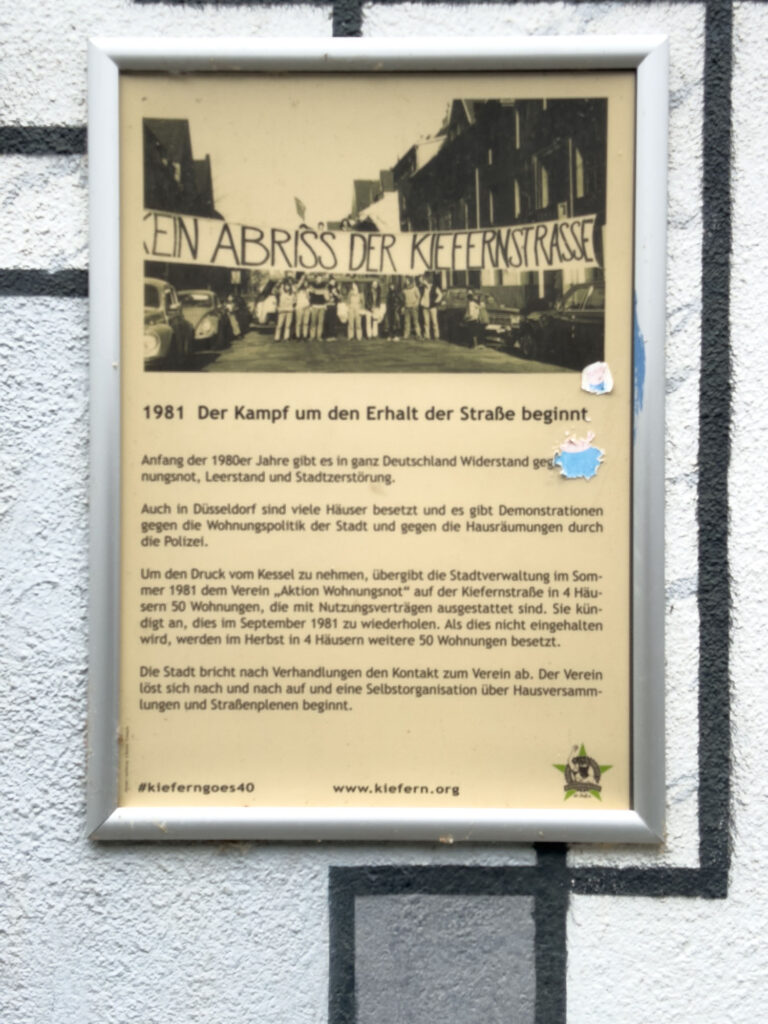 Information sign. Kiefernstrasse street art, Düsseldorf, Germany.