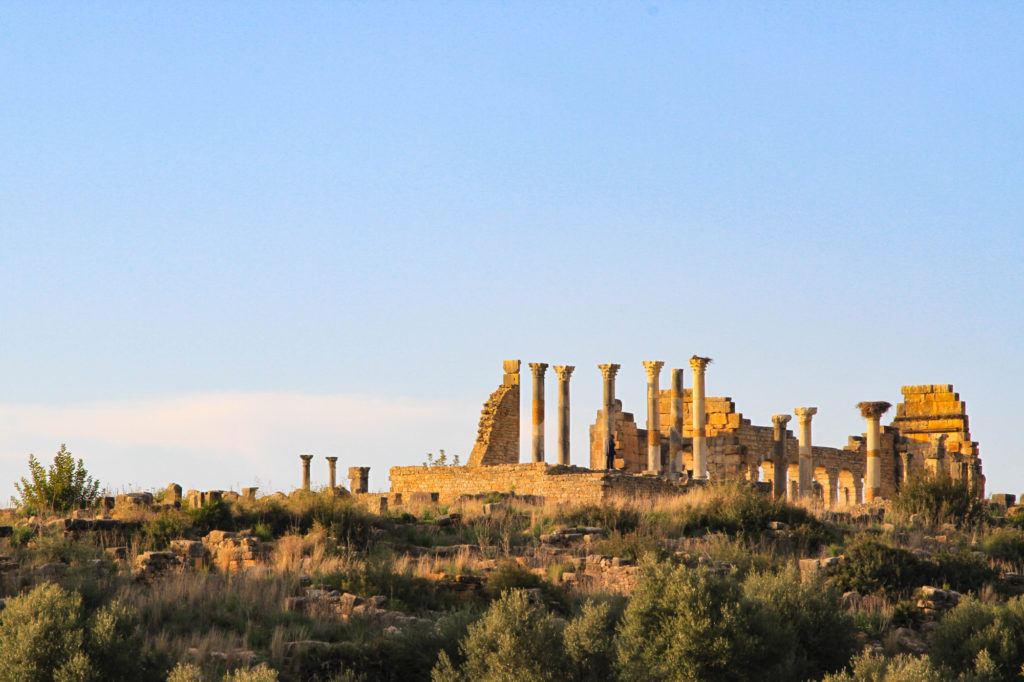 Looking up at the Roman Basilica ruins in Volubilis, Morocco, A UNESCO World Heritage Site.