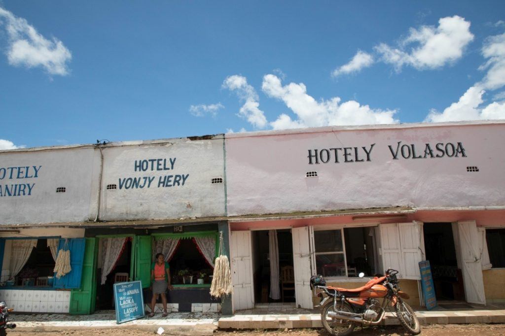 Street with restaurants in a small village along the highway in Madagascar.