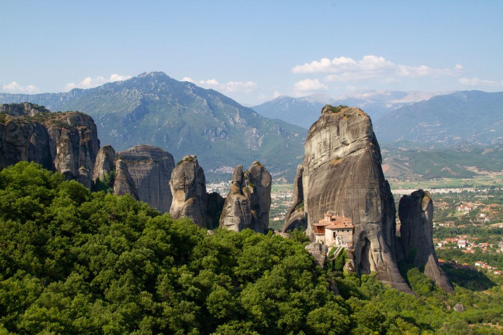 Holy Monastery of St Nicholas Anapafsas is dwarfed by the massive granite columns.