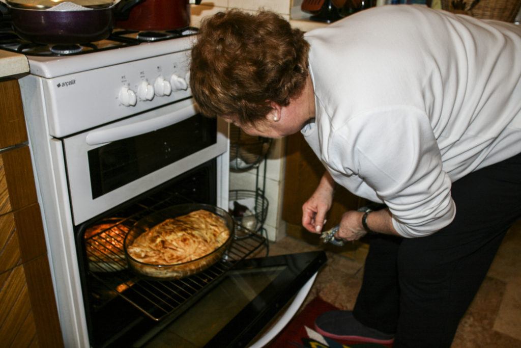 Delectable Turkish borek is coming out of the oven.