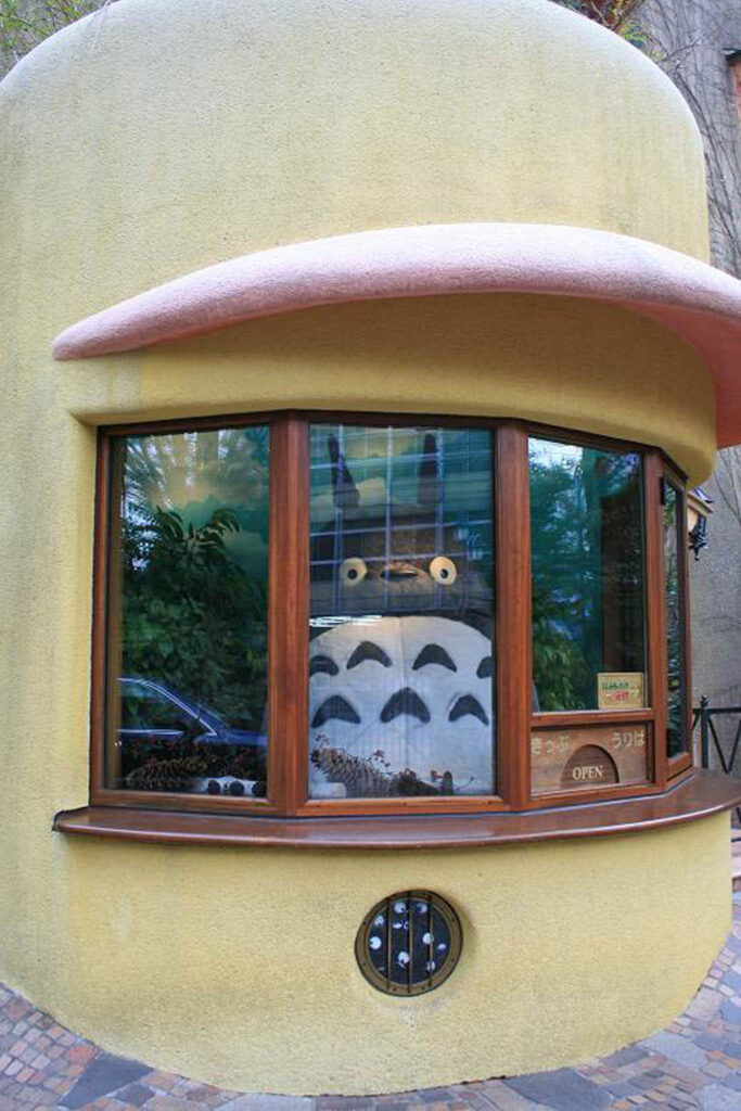 Totoro peeks out of the ticket boot at Studio Ghibli in Tokyo.