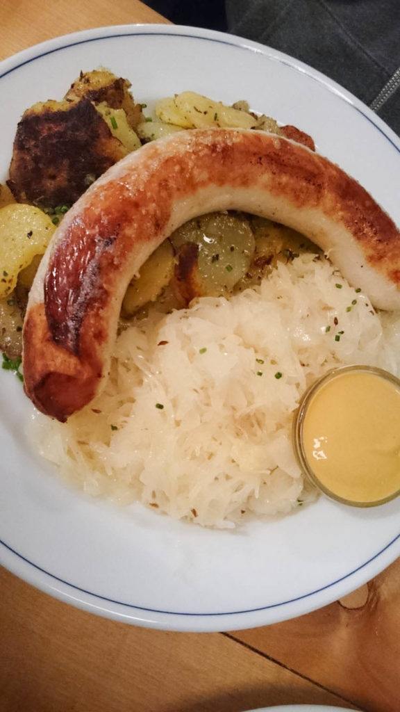This is what every foreigner thinks is German food, bratwurst, home fries, sauerkraut and mustard.