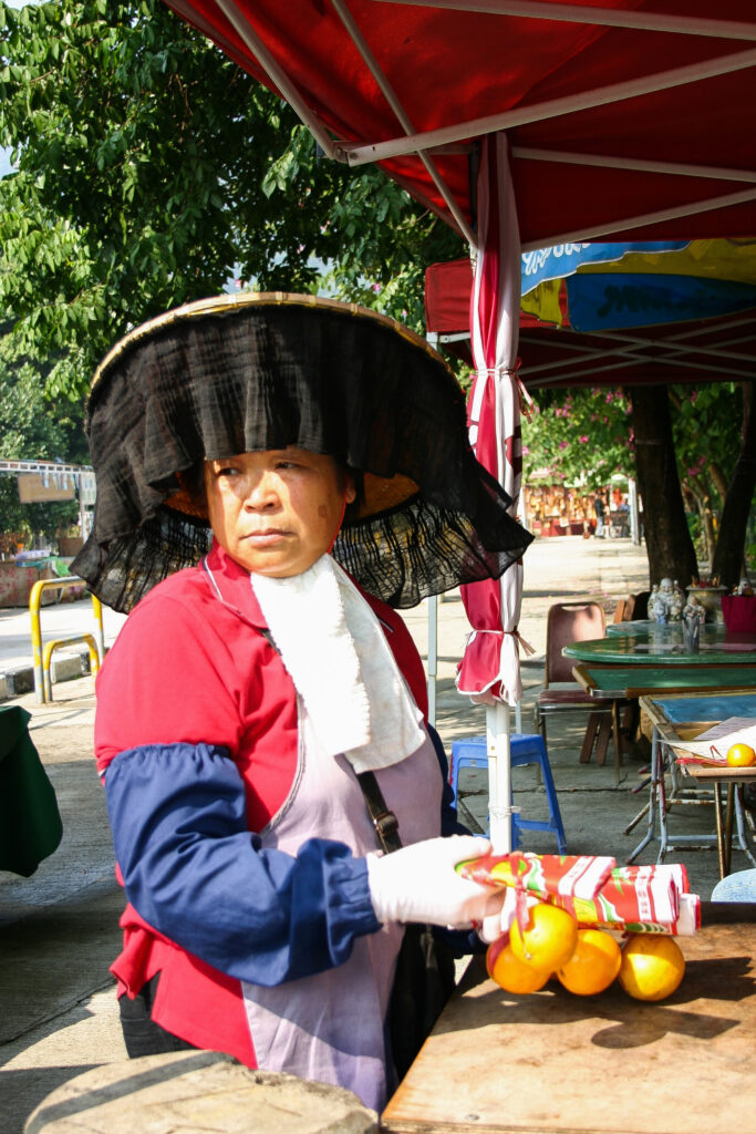 The lady that sells you a way to have your wishes come true in Hong Kong.