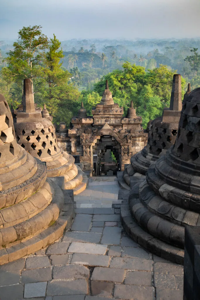 Stupas and stone gate at Borobudur, Java.
