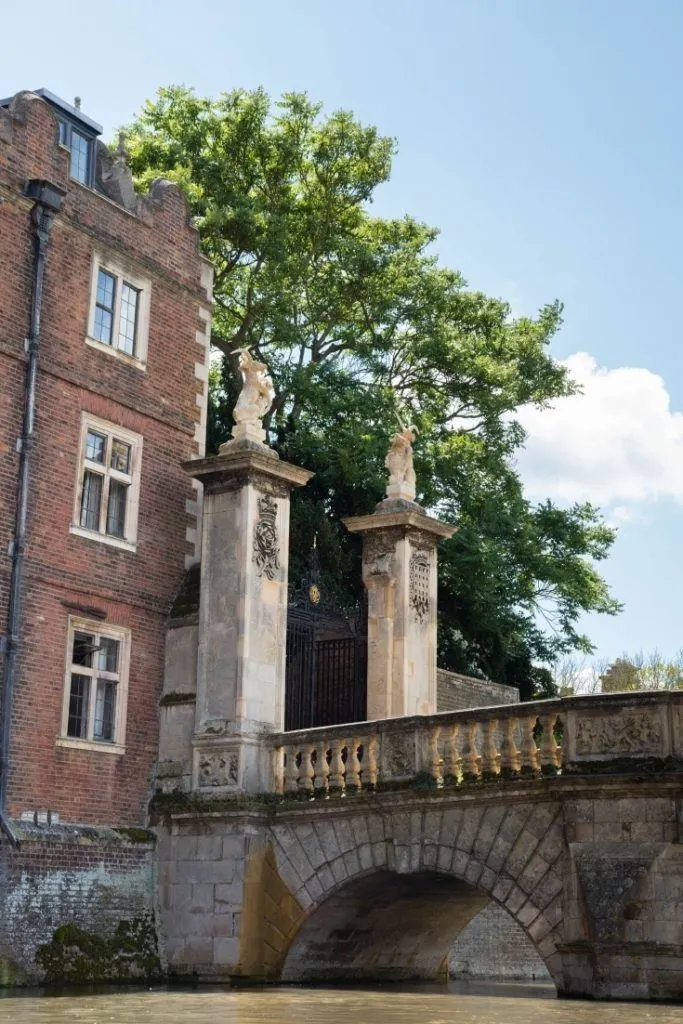 Beautiful architecture and bridge while punting on the water in Cambridge.