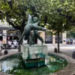 Cartwheel statue in a quaint square in D&uuml;sseldorf, perfect place to sit on a weekend trip.