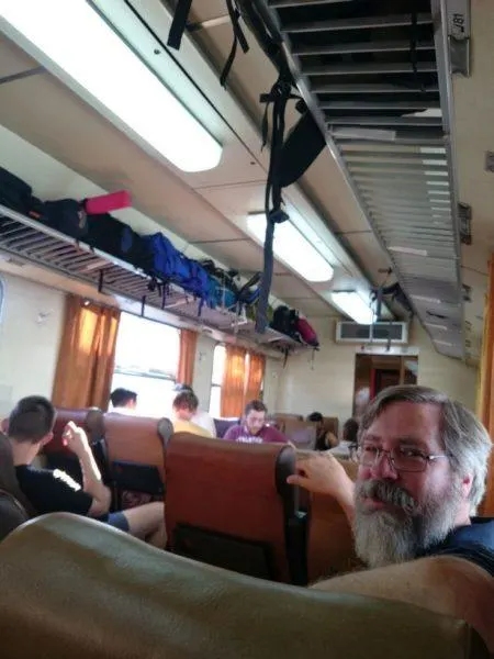 Jim sitting on the train during our train travel in Eastern Europe.