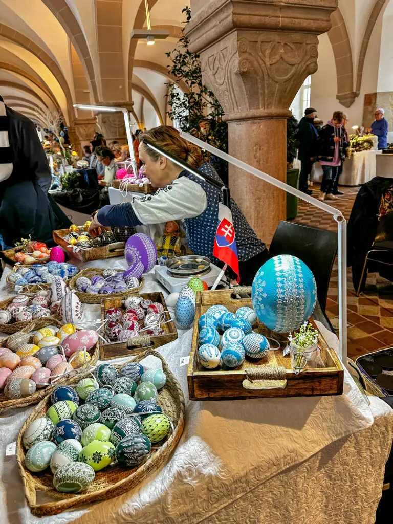 This artist is from the Ukraine, and she decorates her eggs with a lace design.