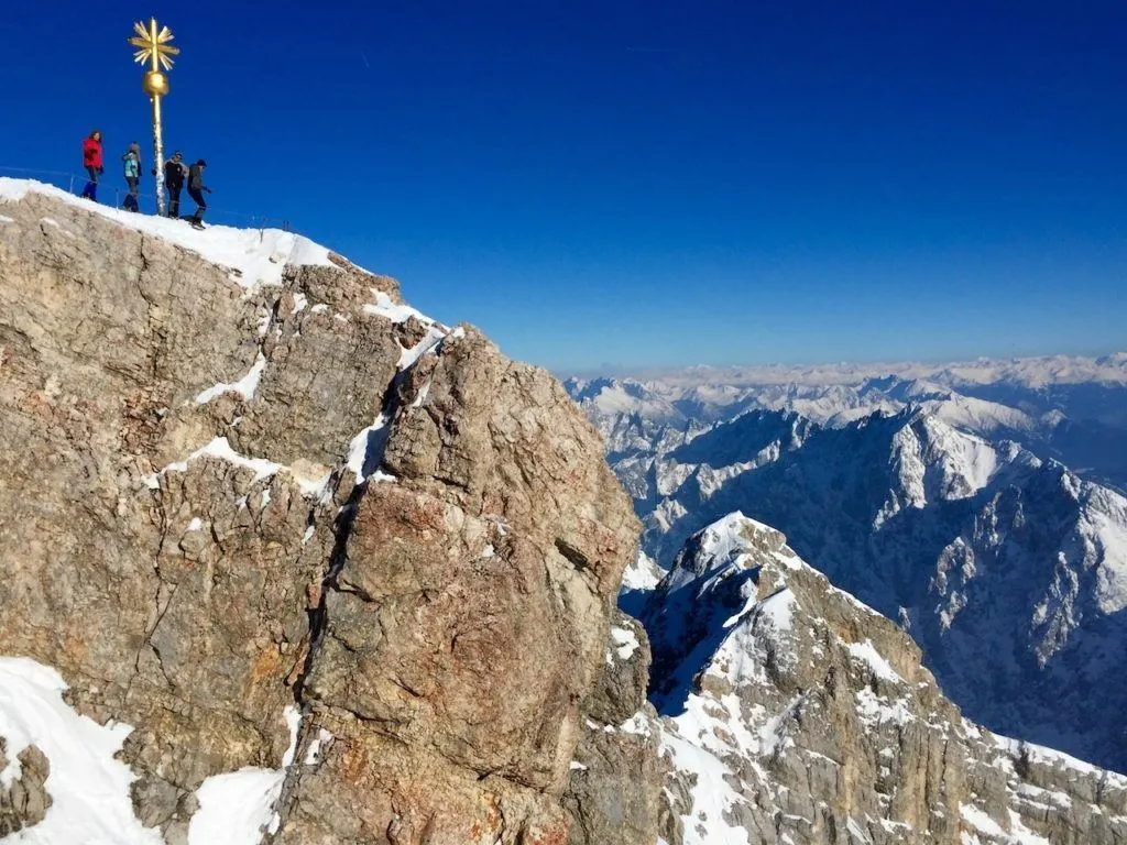 People on top of a mountain in southern Bavaria for a German winter.