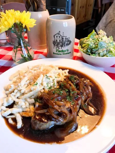 A full German meal with steak and spaetzle.
