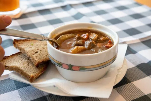 A bowl of gulasch soup.
