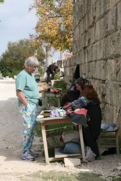 Vendors sell handmade goods outside the Temple of Zeus.