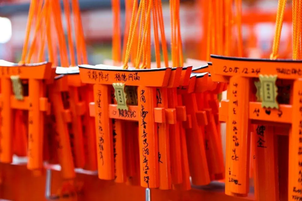 Closeup of Torii Gate prayers at Fushimi Inari Shrine in Kyoto.