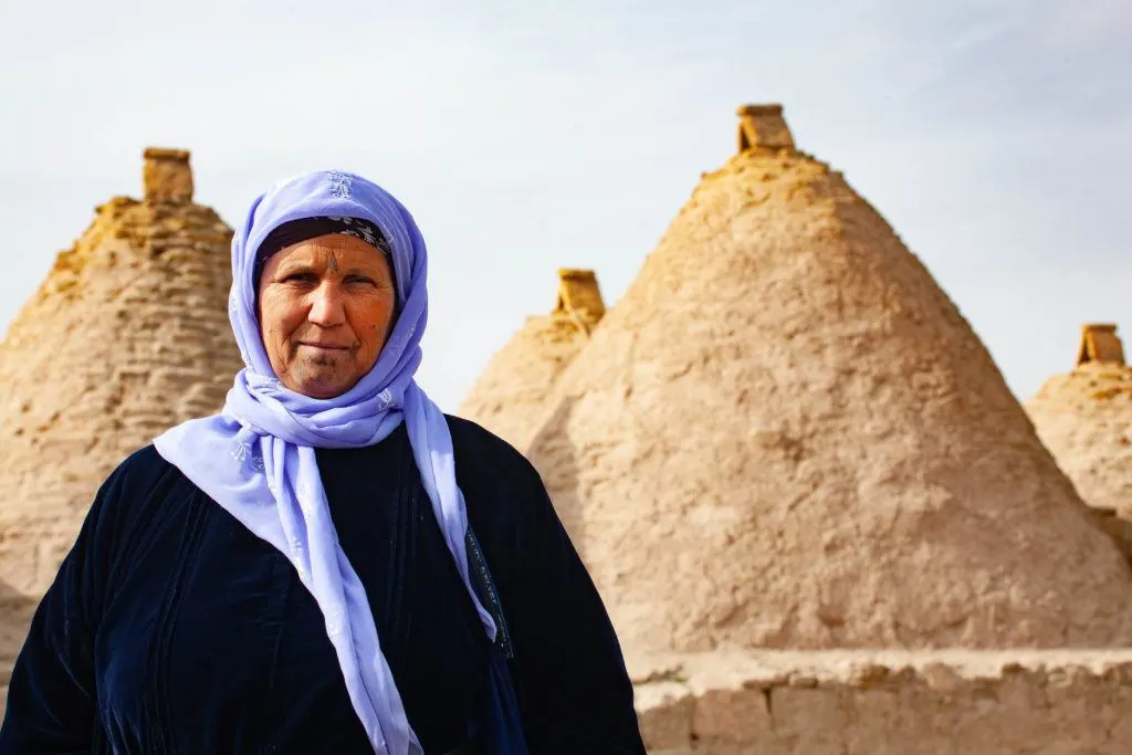 A local woman with tribal tattoos on her face.