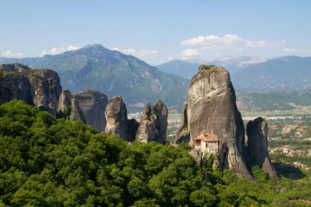 Holy Monastery of St Nicholas Anapafsas is dwarfed by the massive granite columns.