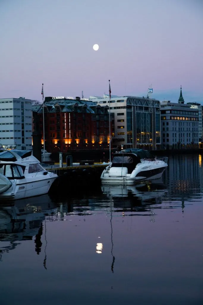 Watch the moon rise over Bergen's in-town harbor.