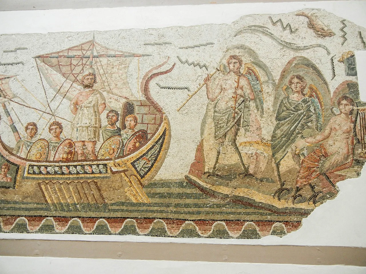 One of the Top things to do in Tunis is the Bardo Museum to see a plethora of stunning mosaics such as this one of the boat and sailors.