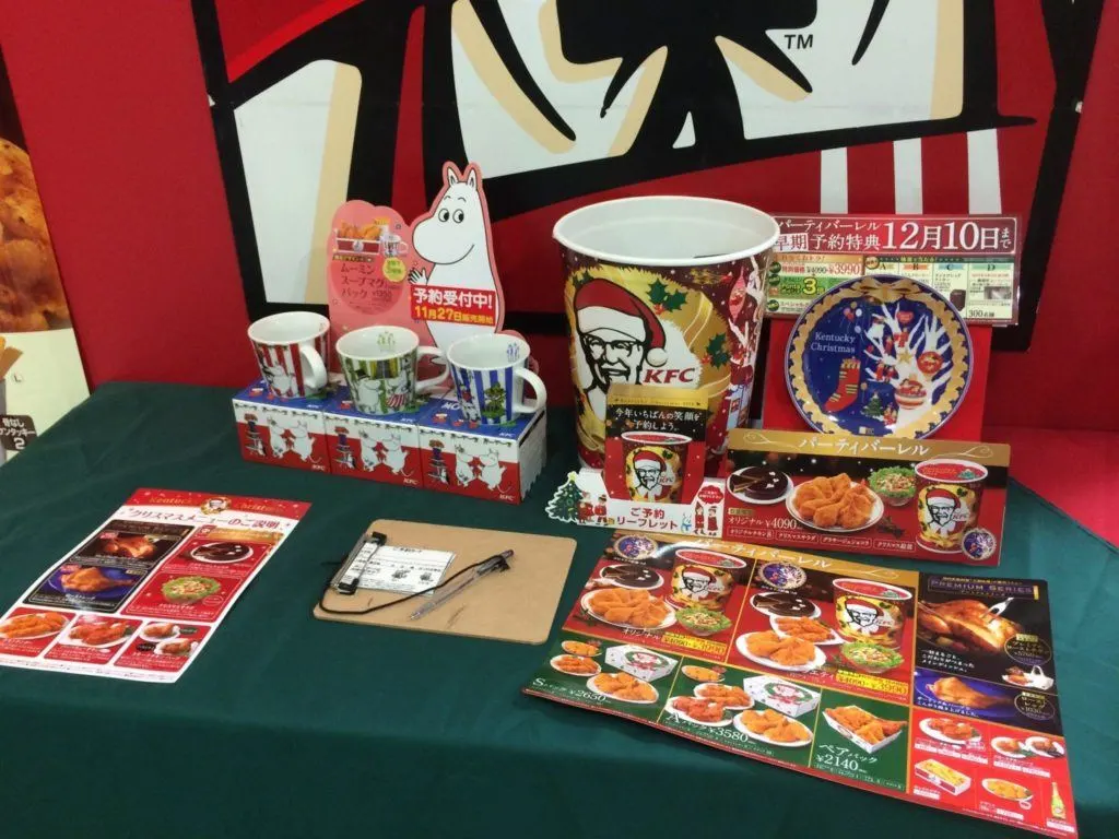 Special mugs, buckets of chicken, and special cake.