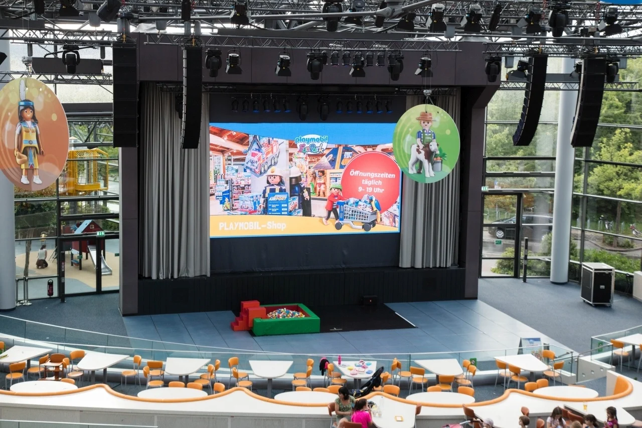 The big building hosts plenty of places to play as well as this Playmobil theater.
