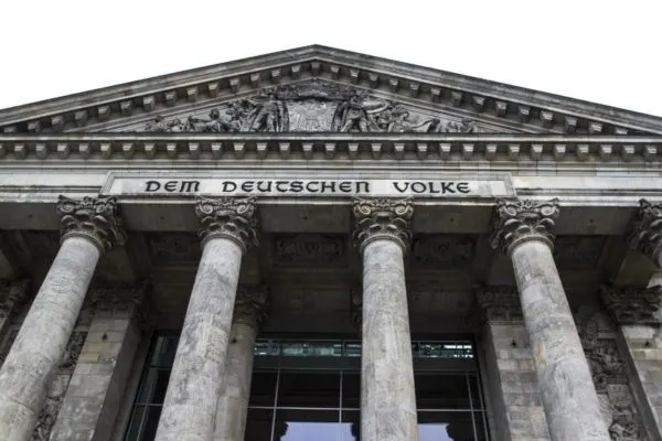 The columns and cravings at the entrance to the. Reichstag in Berlin.