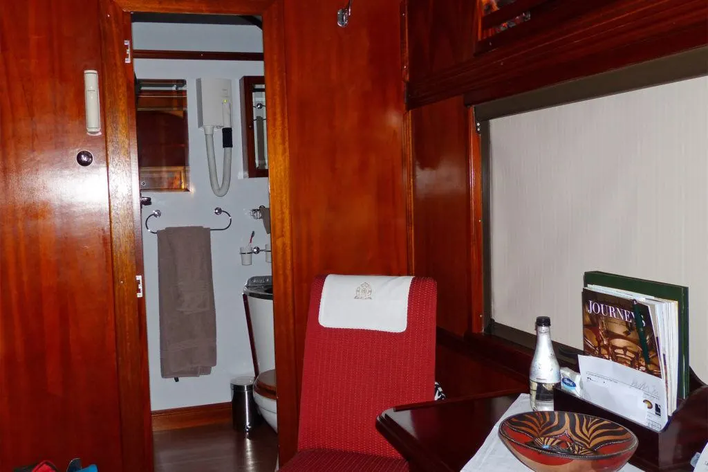Partial view of the sitting area and bath in a Rovos Rail suite.
