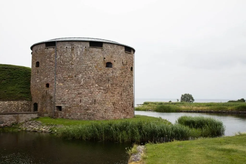 Round wall tower at Kalmar castle and moat.