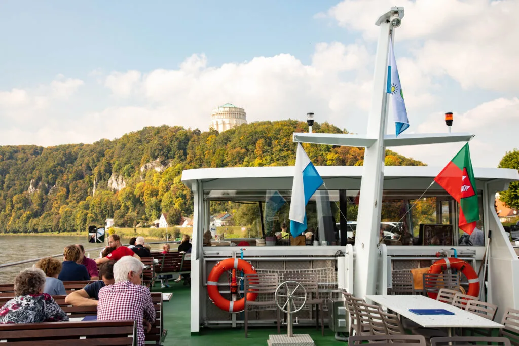The Weltenburg boat sails past Kehlheim.