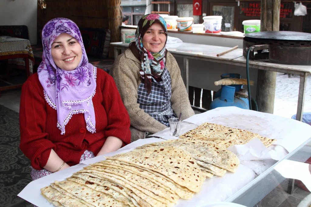 Women selling gozleme along a street in Beypazari.